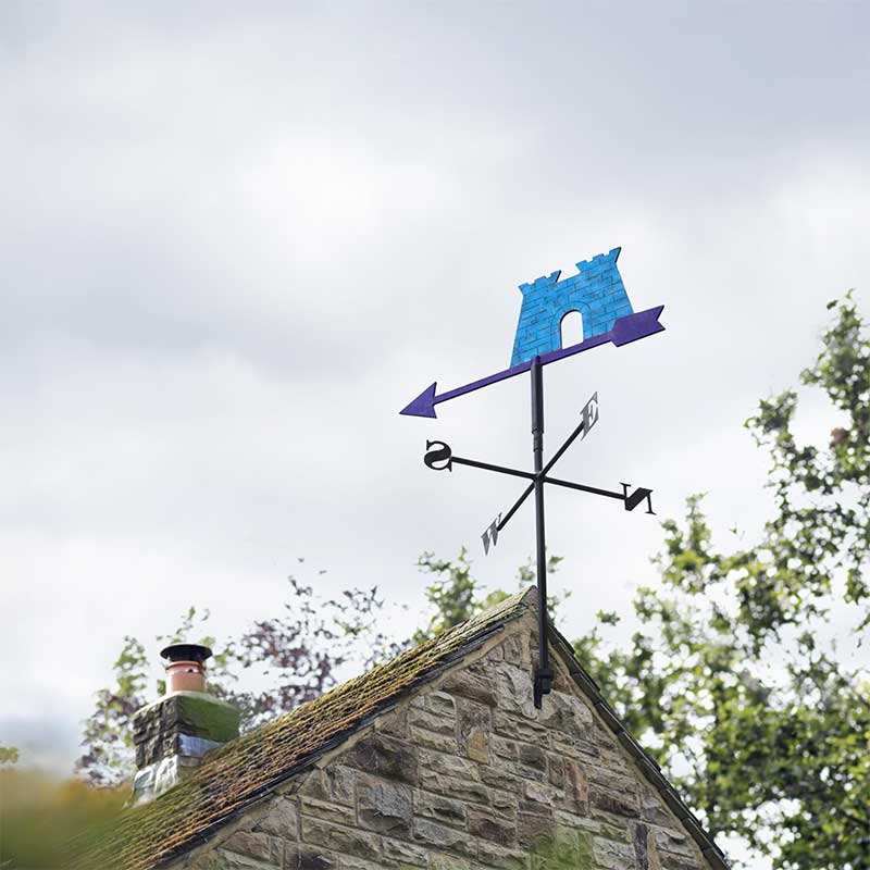 Wind vane pointing south west. The arrow is decorated with the Skipton Logo