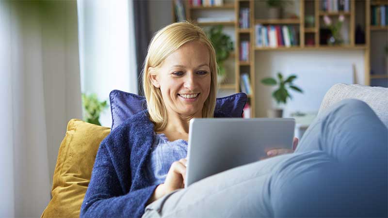 Woman reading on a tablet