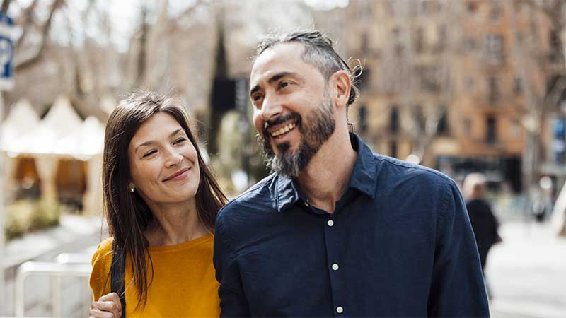 Man and woman smiling