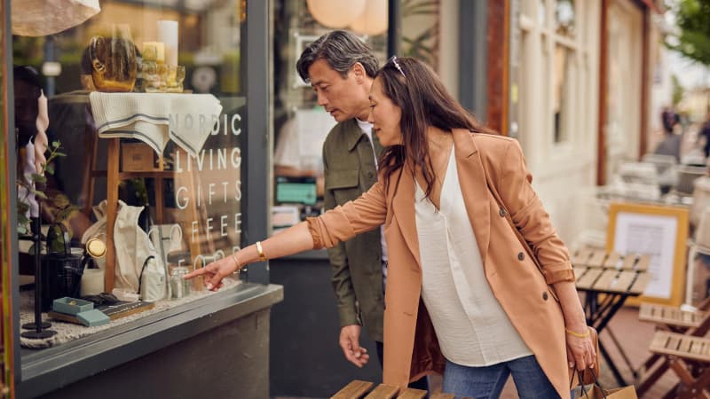 Couple looking in a shop window