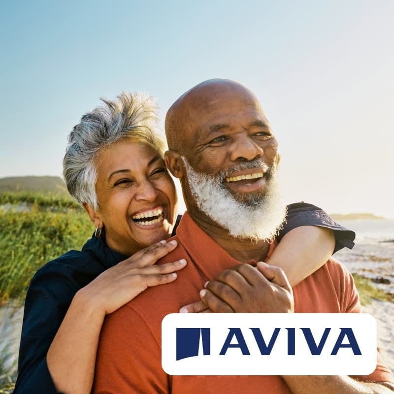 An older couple on a beach with the Aviva logo overlayed.